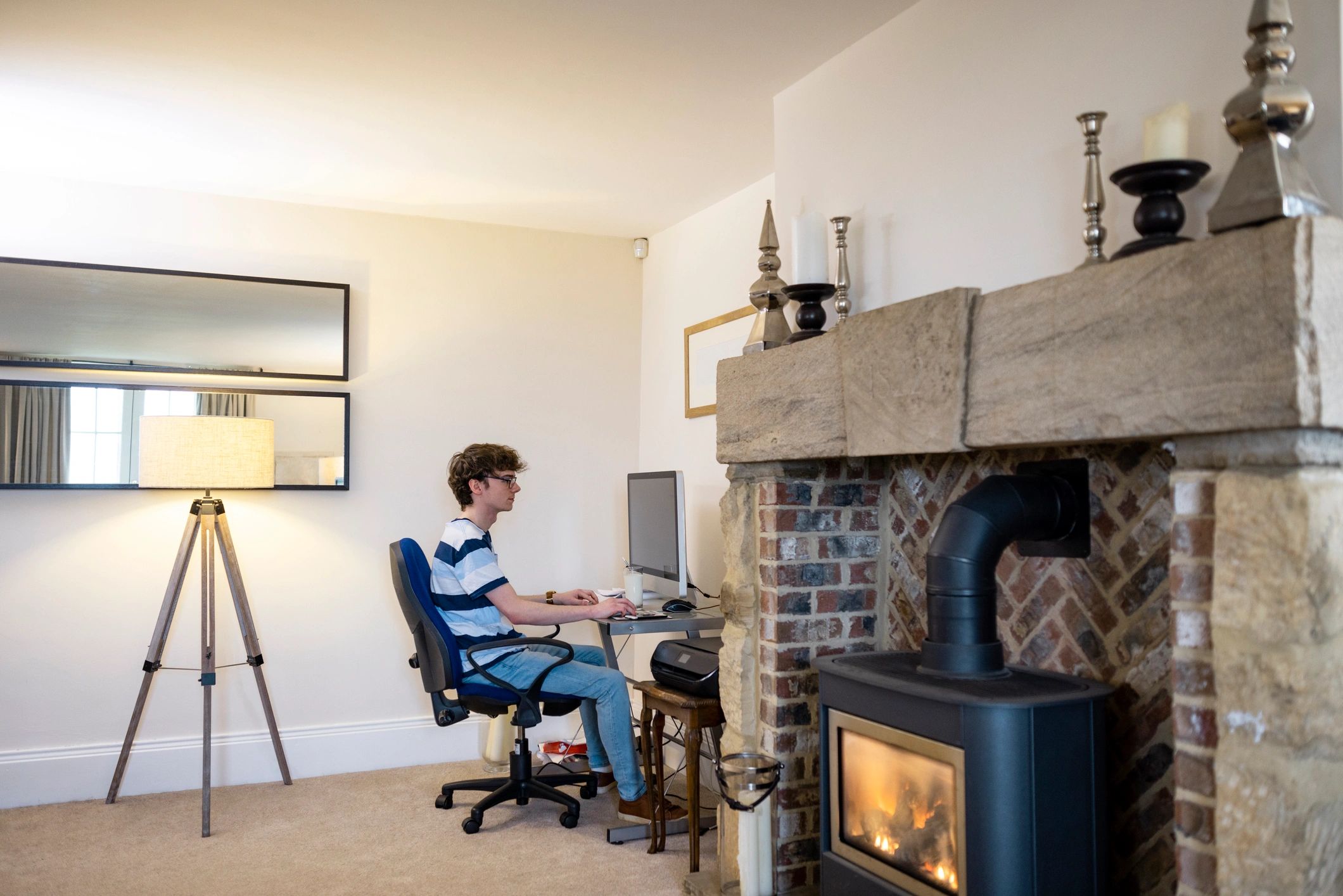 Young gamer at a desktop setup creating content